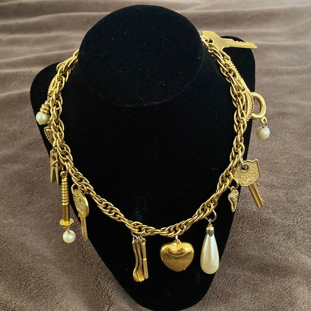 Vintage 1980s Rare Moschino Redwall 15 iconic brand gold charm necklace